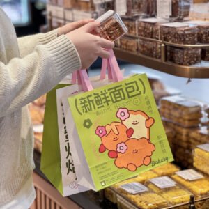 Wholesale Cartoon Sweet Bakery Handheld Paper Bags for Cake Shop Bread and Dessert Takeout - Direct from Factory